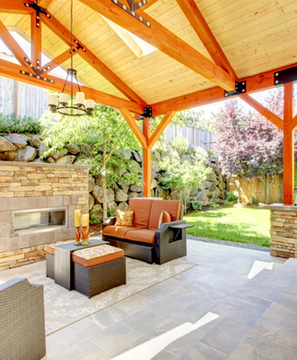 decks-on-point-indianapolis-in-pergola-gazebo-building-a-professionally-constructed-outdoor-living-space-features-a-cedar-pergola-stone-fireplace-wicker-seating-and-commercial-grade-grill-set-on